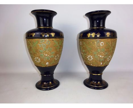 Pair of Doulton Slater's urn shaped vases, with a band of gilt & enamel foliage, impressed marks, 34cm high (2)   Condition R