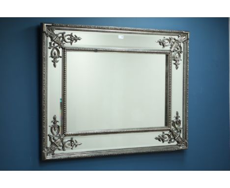 French style silvered cushion framed wall mirror, 90cm x 120cm   Condition Report   Click here for further images, condition,