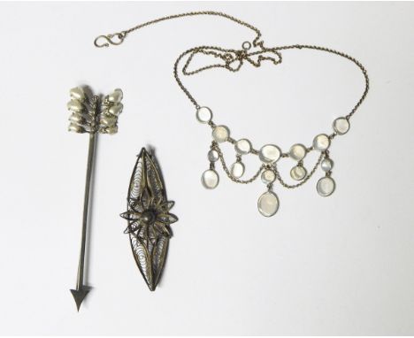 Silver fringe necklace set with moonstone cabochons, arrow brooch and filigree brooch with central flowerhead (3) 