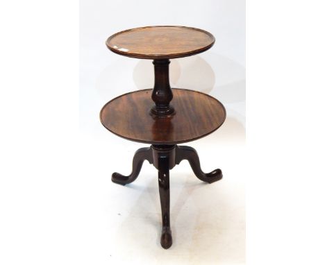 19th century mahogany circular standing Lazy Susan having graduated circular trays, the top with inlaid roundel, on baluster 