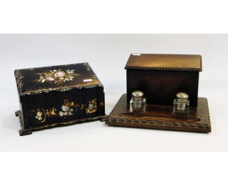 Mother of pearl inlaid papier mache casket, 19th century rosewood writing box, 19th century mahogany tea caddy and an oak sin