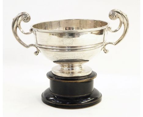 Silver two-handled pedestal bowl by Walker & Hall, Sheffield 1911 of circular form with moulded girdle and scroll handles, wi