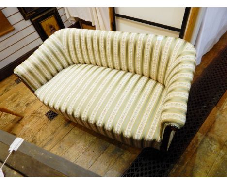 Edwardian two-seat sofa upholstered in a Regency-style striped fabric and having patterae and line inlaid mahogany frame 