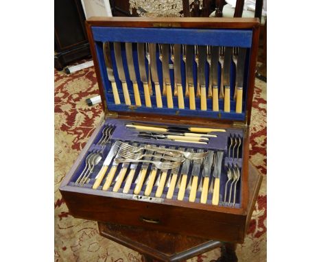 Canteen of silver plated flatware of stylised dog nose design, comprising 12 table knives and forks, 12 dessert knives and fo