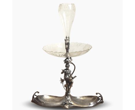 WMF silver plated centrepiece, the base with two recesses surmounted by a seated lady with flowers and a bird, ivy tendrils f