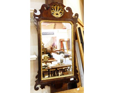 Chippendale style mahogany and parcel gilt wall mirror having fret carved surround, 88cm x 45cm 