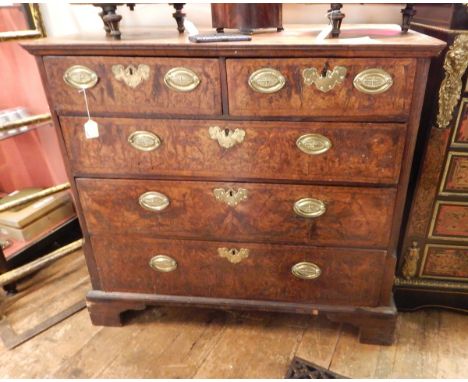 18th century figured walnut chest of two short and three long graduated drawers, ogee mould top, the drawers with herringbone