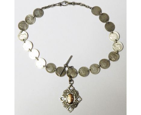 Victorian silver watch chain, the links interspersed with Victorian three pence coins and with a silver fob suspended from it