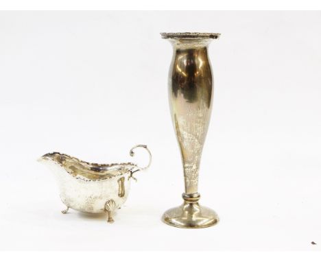 Silver sauceboat, Birmingham 1938 with leaf cap scroll handle on three hoof feet and silver vase of baluster form, 23cm high 