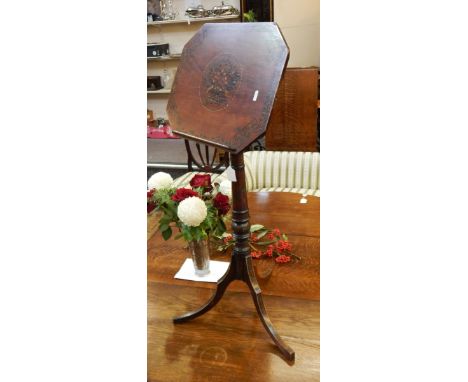 19th century painted mahogany music/reading stand having octagonal adjustable top painted with flaming torches and scrolling 