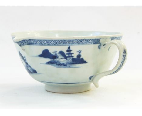 Chinese porcelain Nanking Cargo pouring bowl, sold by Christie's, with lakeside landscape in underglaze blue and brocade bord