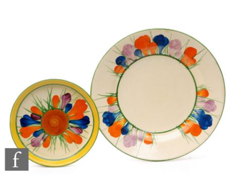 Clarice Cliff - Crocus - A small circular coaster circa 1929, radially hand painted with crocus sprays with yellow and green 