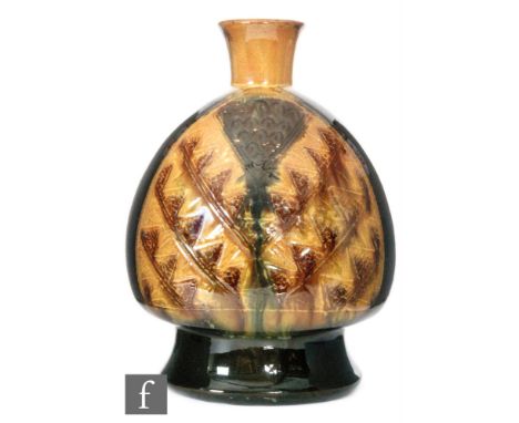 Christopher Dresser - Linthorpe Pottery - A vase of Peruvian influence, of tapered ovoid form, rising from a high footring, t