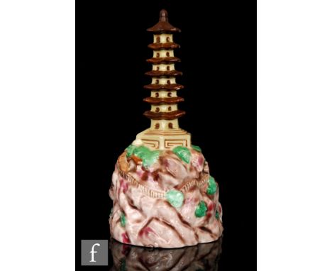 Clarice Cliff - Pagoda - An A.J. Wilkinson flower bowl centre block circa 1924/25, modelled as a Chinese pagoda above a rocky