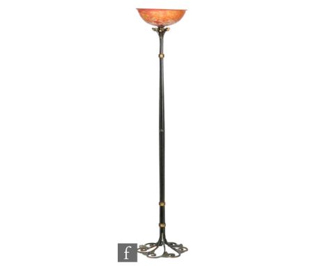 Daum - A 1920's wrought iron standard lamp with a scroll work base detailed with pine cones and leaves rising to square verti