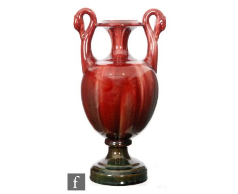 Attributed to Christopher Dresser - Linthorpe Pottery - A collection of three art pottery vases/ewers, to include a bottle va