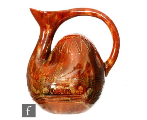 Christopher Dresser - Linthorpe Pottery - A late 19th Century 'Hump back' water jug, with loop handle, the treacle glazed bod