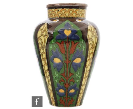 Frederick Rhead - Wileman &amp; Co / Foley - A late 19th Century Intarsio vase decorated with panels of stylised flowers with