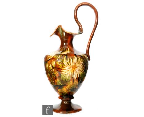 Attributed to Christopher Dresser - Linthorpe Pottery - A 19th Century 'Classical' jug of baluster form with frilled rim, the