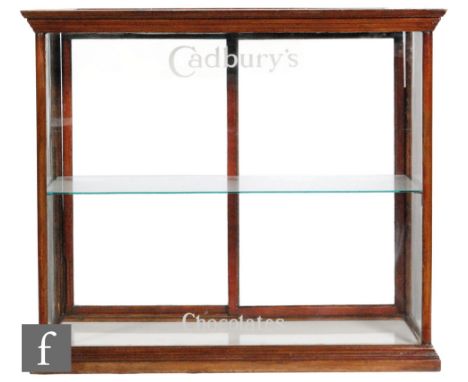 Cadbury's - An early 20th Century mahogany framed counter shop display confectionery cabinet, fitted with a single glass shel