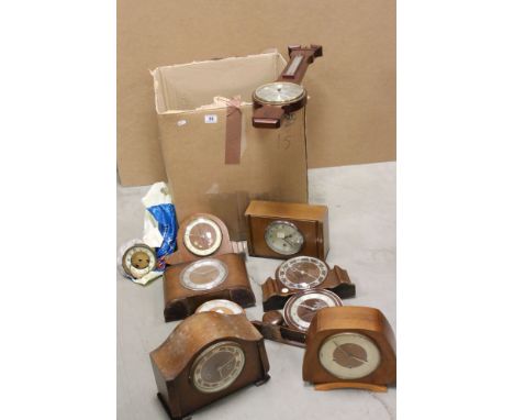 A collection of vintage clocks and barometers to include Metamec and Smiths examples. 