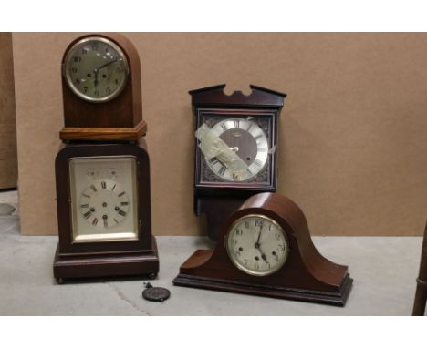 A collection of four vintage wooden cased mantle clocks. 