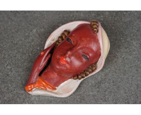 Goldscheider Terracotta miniature face mask, white shawl, brown face. 
