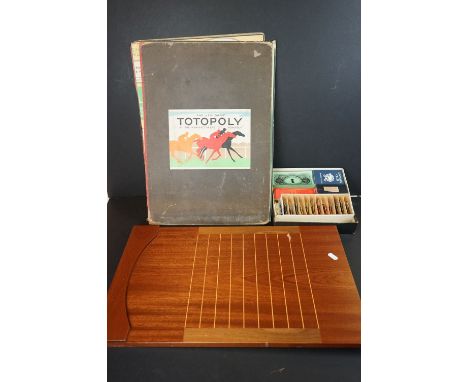 A vintage Totopoly board game together with a wooden shove halfpenny board. 