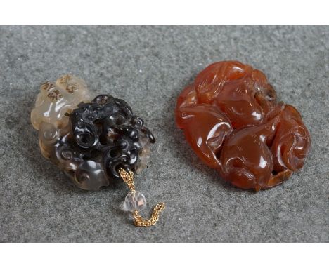 A Chinese Jade finely carved pendant with character mark signature together with a jade amulet. 