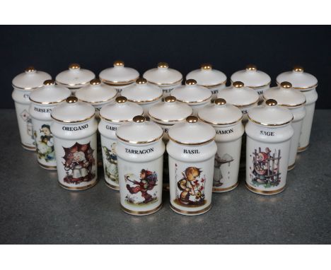 A collection of twenty M.J. Hummel spice jars. 