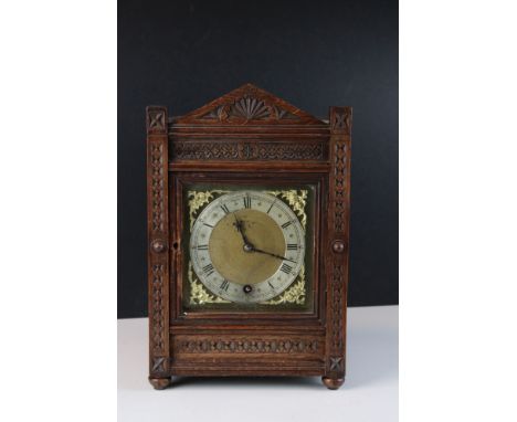 A vintage wooden cased mantle clock, marked Tree of 121 Gt. Dover St. S.E. London. complete with key. 