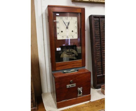 A vintage National Time Recorder Co. punch card machine, dial marked St. Mary Cray, Kent.