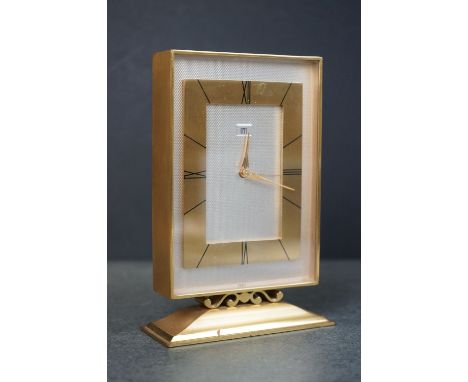 Mid 20th century Swiss Uti 8 day Alarm Gilt Cased Mantle Clock, 16cms high 