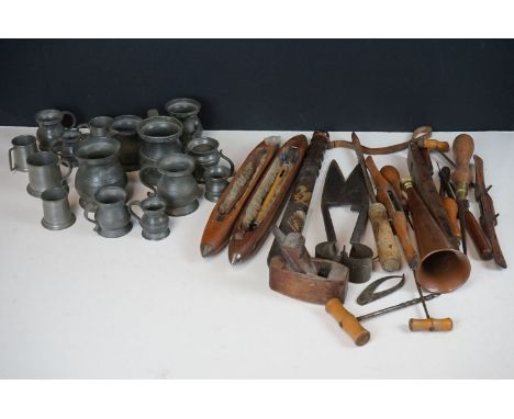 A group of mixed collectables to include pewter tankards, clippers, tools and wooden boat loom shuttles. 