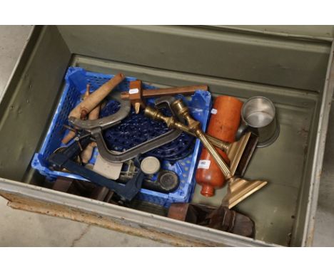 A group of mixed collectables to include tools, candlesticks and metal ware contained within a vintage metal trunk. 