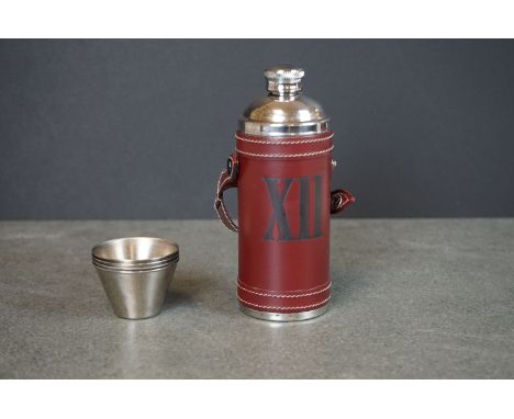 Cased drinking flask with four cups 