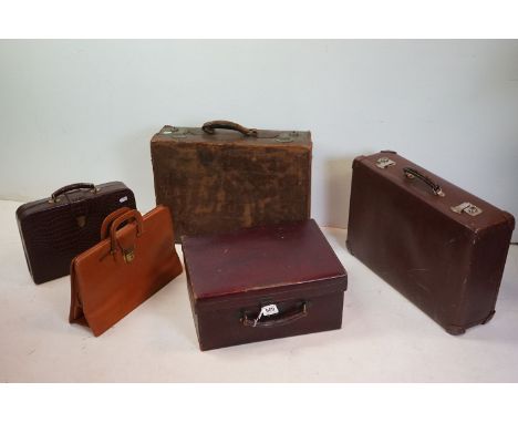 A vintage leather fitted vanity case by J.W. Benson Ltd London, together with two small suitcases &amp; two other cases (5) 
