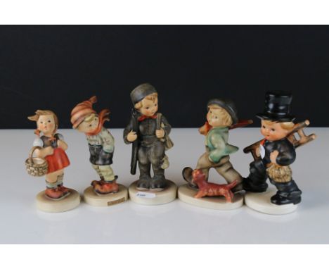 Five Goebel Hummel Figures including March Winds, Little Shopper, Strolling Along and Two Boys carrying Ladders, tallest 14.5