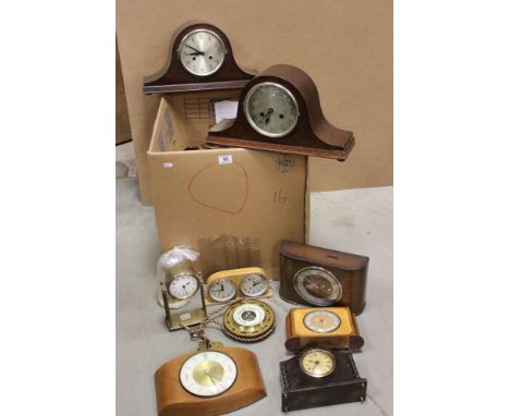 A collection of vintage clocks and barometers to include anniversary and mantle examples. 