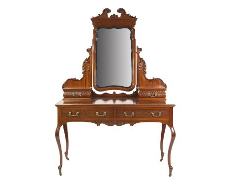 LATE NINETEENTH/EARLY TWENTIETH CENTURY CARVED MAHOGANY DRESSING TABLE, the rounded oblong top surmounted by a shaped oblong,