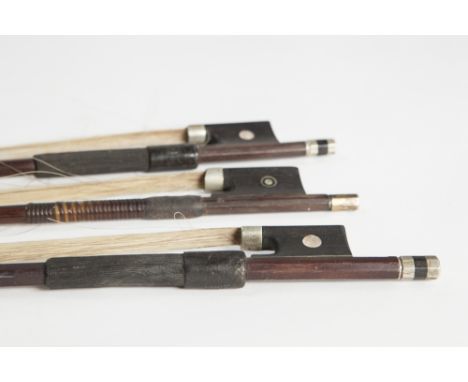 VIOLIN BOW with octagonal stick stamped Vuillaume A Paris, 29" long overall and TWO OTHER VIOLIN BOWS with round sticks (3)