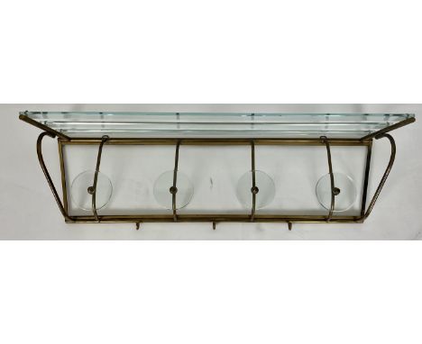 A vintage gilt brass and glass hanging rail and shelf, French circa 1950
The three railed shelf above four roundels and three