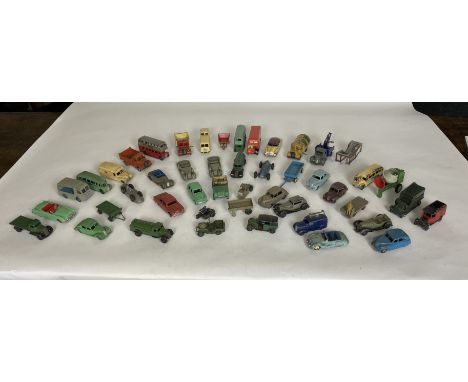 A vintage selection of playworn Dinky toy cars and other vehicles
Including a tin plate bus by another manufacturer and a bri