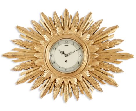 A mid 20th century giltwood starburst clock, the movement by Smiths

67cm wide
