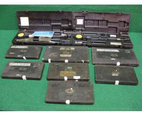 Two boxed bore gauges and seven cased M&W micrometers