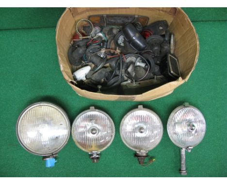 Box containing Lucas spot lamps together with other light fittings