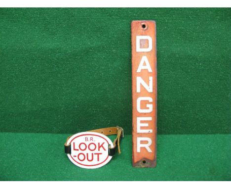 Enamel BR Lookout arm band together with a red and white vertical danger sign