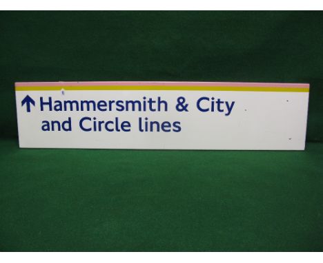London Underground enamel sign for Hammersmith & City and Circle Lines with an arrow, blue letters on a white ground with pin