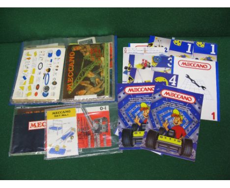 Approx twenty six Meccano instruction books and catalogues (most contained in binder) including an Elektrikit copy and a 1975