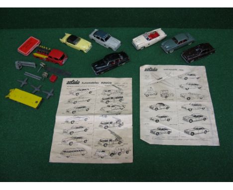 Early die cast clockwork Solido model cars in various conditions to include fire engine and trailer together with some parts,